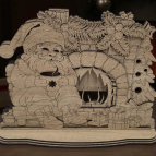 Drevený Santa pri krbe